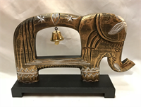 Wooden feng shui elephant hanging a lucky bell