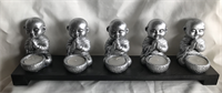 Five small monk candle holders Material: resin, wood, candle